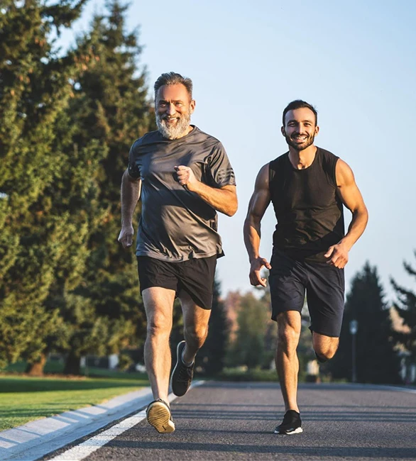 Men's health compounding: two men jogging outdoors